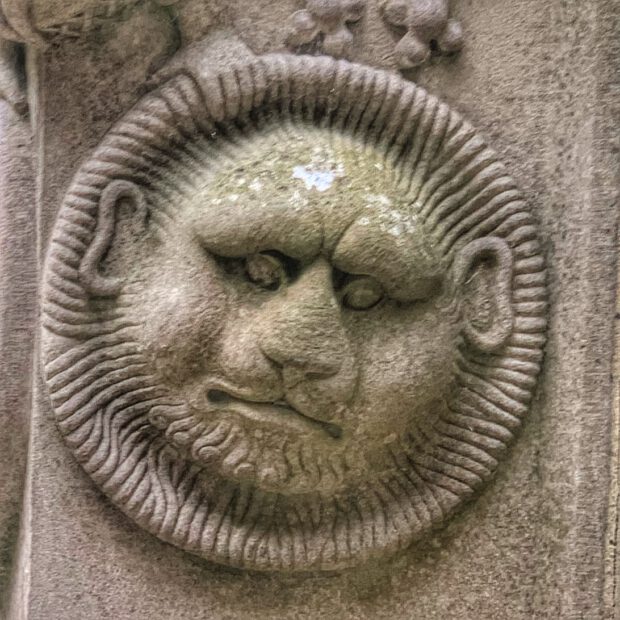 Linlithgow Palace Fountain Detail, a face of either a lion with human ears of a sun?